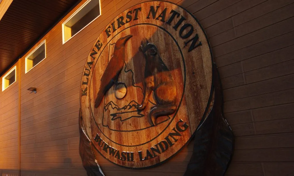 Kluane First Nation community logo carving